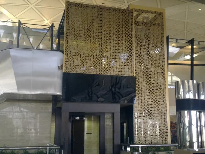 A gold-latticed screen, glass balustrade and polished fittings in a terminal hall at King Khalid International Airport in Riyadh, photographed on 3 July 2012, a file photograph of the airport named in the Houthi claims and not of any attack or damage