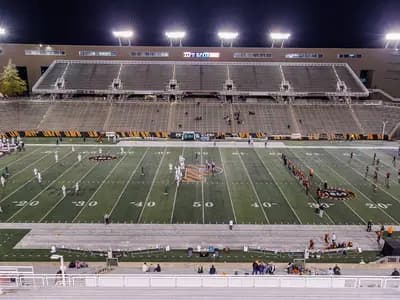 A night game at Princeton Stadium, illustrative of college football under lights and not the Indiana-Northwestern game itself, photographed in November 2024