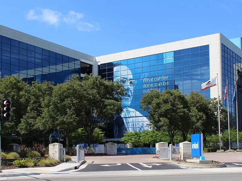 The Robert Noyce Building at Intel's headquarters on Mission College Boulevard in Santa Clara, California, a blue glass tower with a banner on its facade and an Intel sign at the entrance, photographed on 2 July 2023, a file photograph of the headquarters and not of this week's results
