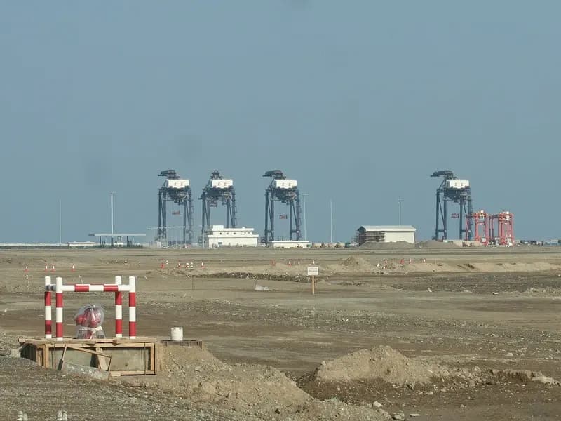 Container cranes at the port of Sohar in Oman, photographed in December 2006, a file photograph of the port town near where the tanker was hit and not of the vessel or the attack