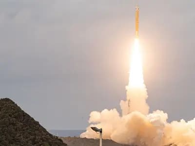 An H3 rocket rising on a column of flame and smoke from the Tanegashima Space Center in Japan, photographed on 2 February 2025 during the launch of a different payload, a file photograph illustrative of the H3 and the launch site and not of the MMX launch