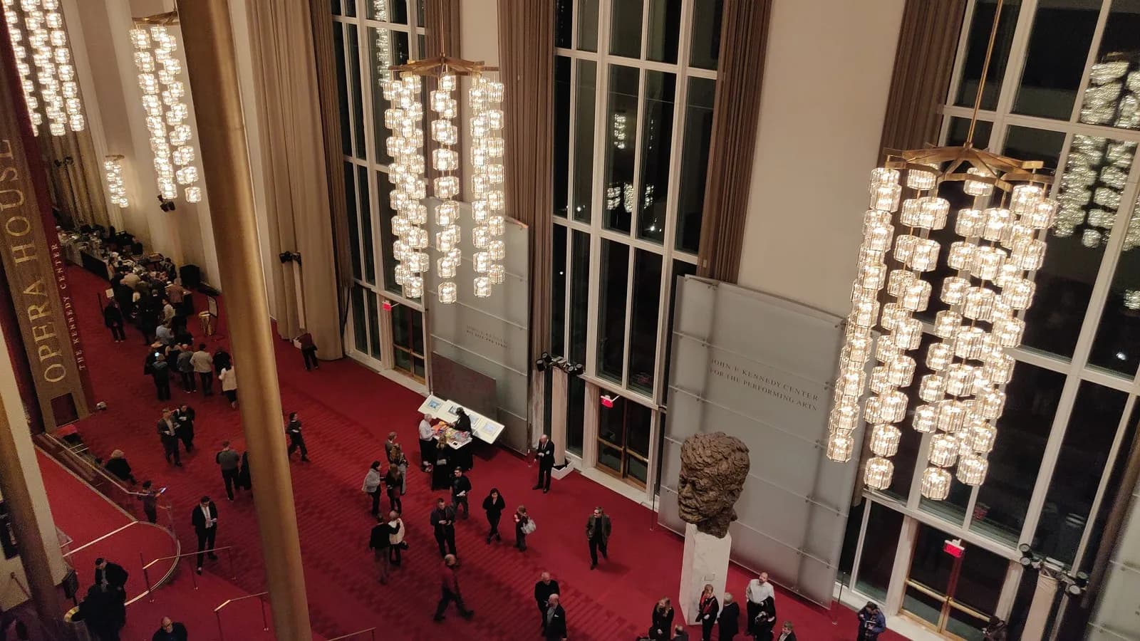 Patrons in the Grand Foyer of the Kennedy Center during an opera intermission in December 2019, under the Orrefors chandeliers, before the ceiling gave way