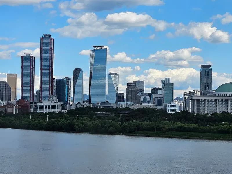 Skyscrapers of the Yeouido financial district in Seoul across the Han River, with the dome of the National Assembly building at right, photographed on 28 May 2024, a file photograph and not from Thursday's trading
