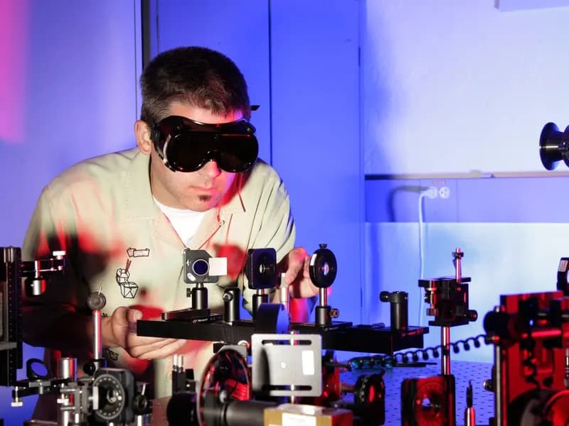 A laser optics setup at Idaho National Laboratory, illustrative of the kind of photonics apparatus used in entanglement research and not the Kyoto team's own circuit, photographed in August 2007