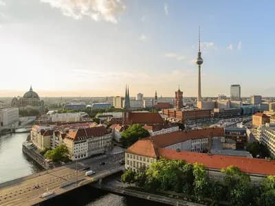 The Berlin skyline with the Fernsehturm and the River Spree in evening light, photographed in June 2023, a file photograph of the city where the commission was launched and not of the World Health Summit
