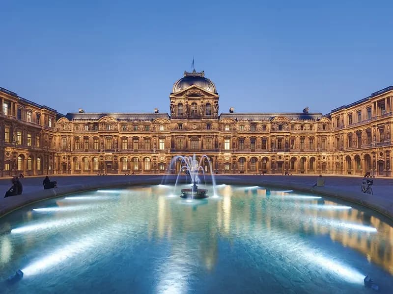 The Cour Carree of the Louvre in Paris at dusk, photographed on 2 April 2009, a file photograph and not from Tuesday's Louis Vuitton show