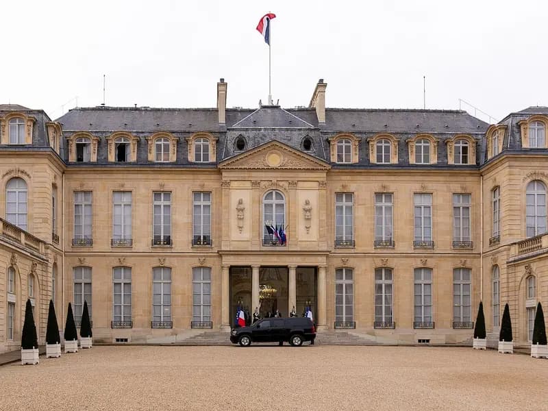 The front courtyard and main facade of the Elysee Palace in Paris with a French flag on the roof and a dark car by the steps, photographed on 16 November 2020, a file photograph of the presidential palace and not from this week's Gulf tour