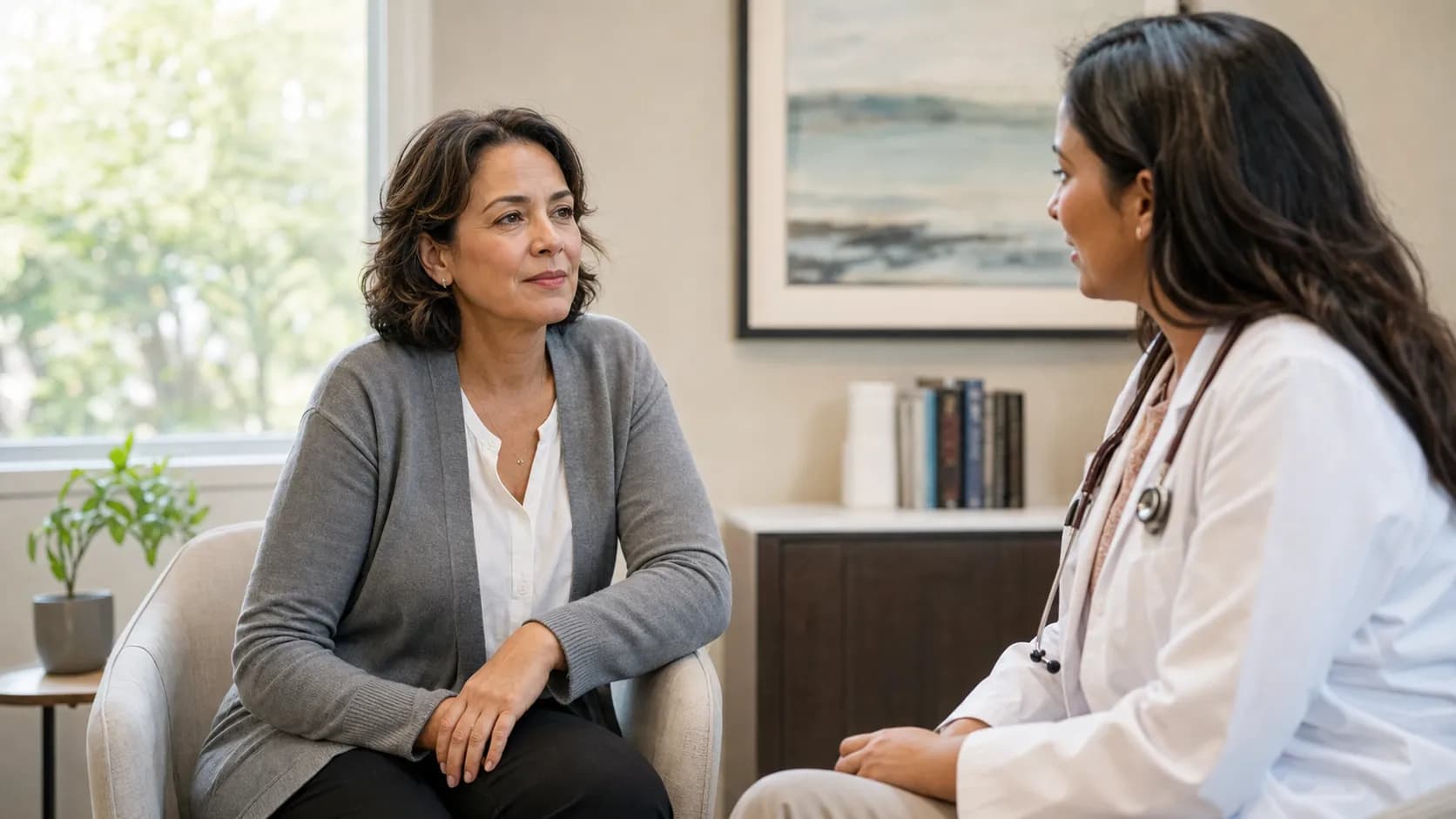 A midlife woman discussing health concerns in a calm setting