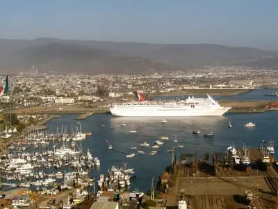 A view over the harbour and city of Ensenada, Baja California, with a cruise ship alongside the pier and mountains behind, photographed on 15 July 2006, a file photograph of the city and not of the case