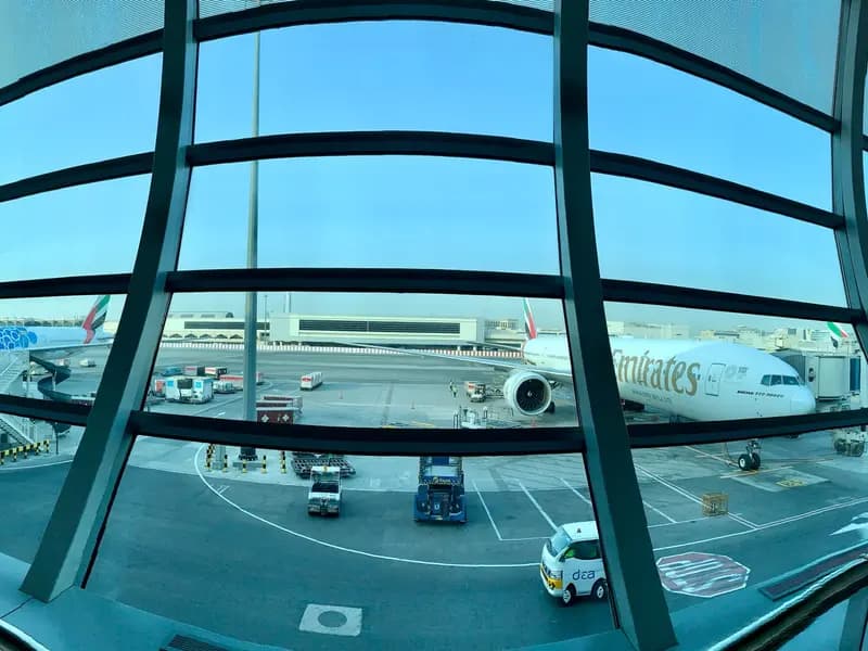 Aircraft at the gates seen from inside Terminal 3 at Dubai International Airport, photographed in 2019