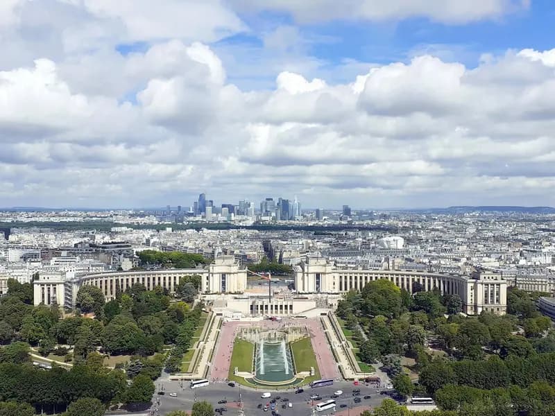 Paris seen from the Eiffel Tower, with the Trocadero in the foreground and the towers of La Defense on the horizon; Mistral is based in the city