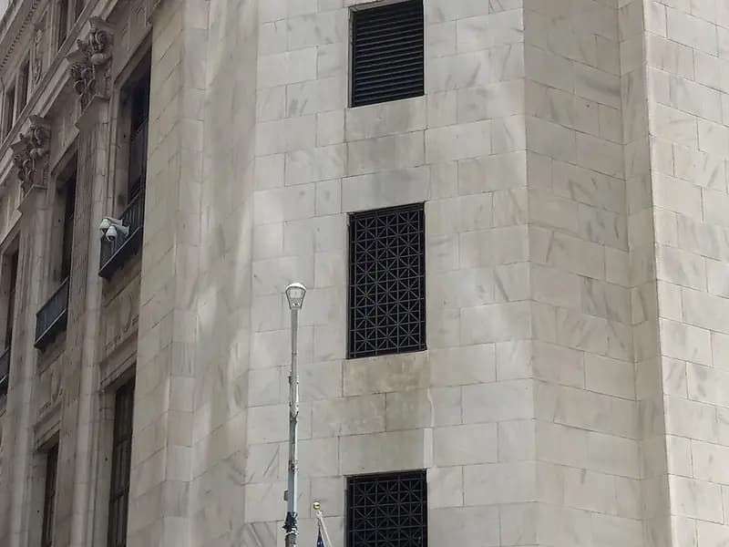 The columned facade of the New York Stock Exchange on Wall Street in New York, photographed on 29 June 2024, a file photograph and not from Friday's trading
