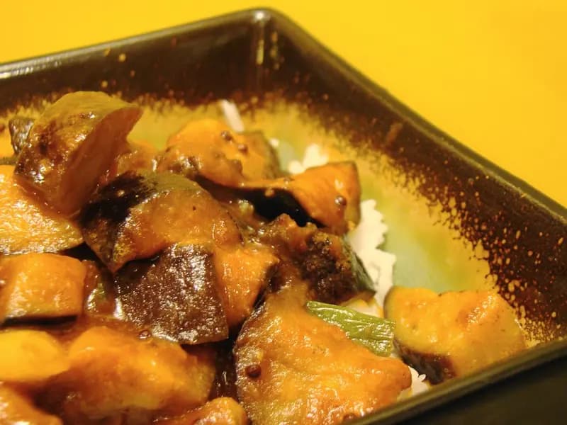 A deeply spiced slow-roasted lamb shoulder served with saffron rice