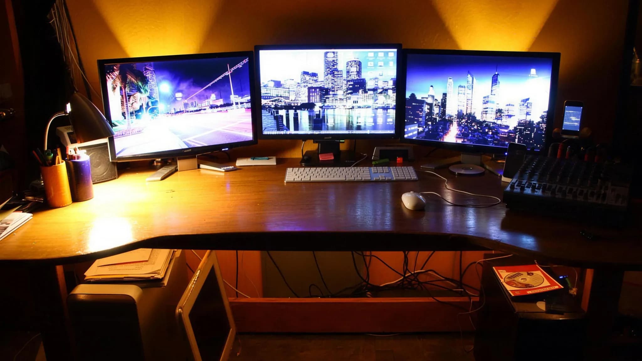 A developer workstation with a code editor and several windows open