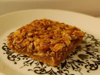 A square pecan bar with a glossy caramelised nut topping on a decorative plate, photographed on 22 September 2011, a file photograph of the dish and not of the Firehouse Subs bar