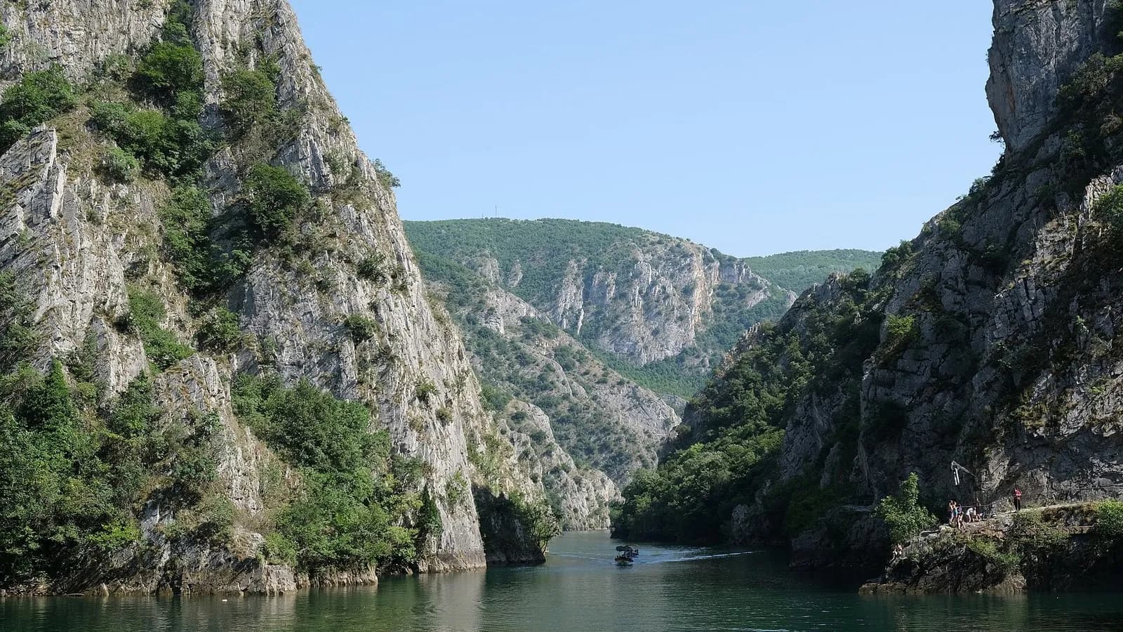 Green water of Matka lake between steep rocky canyon walls near Skopje in North Macedonia, photographed on 19 July 2023, a file photograph of the canyon that holds Vrelo Cave and not of the dive or the cave itself
