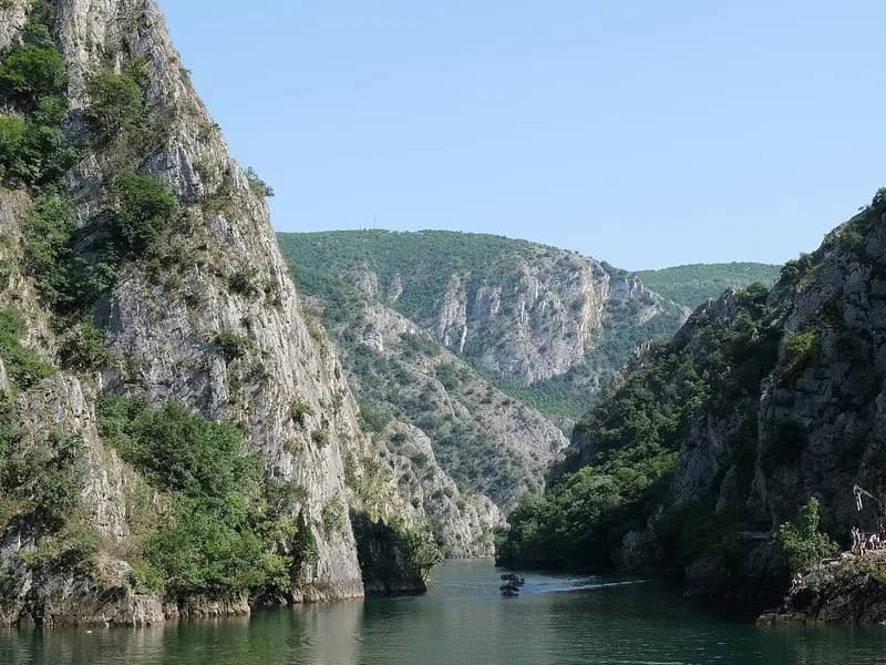 Green water of Matka lake between steep rocky canyon walls near Skopje in North Macedonia, photographed on 19 July 2023, a file photograph of the canyon that holds Vrelo Cave and not of the dive or the cave itself