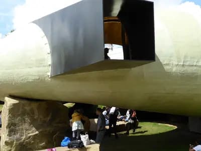 Smiljan Radic's 2014 Serpentine Gallery Pavilion in London, a shell resting on rough stones