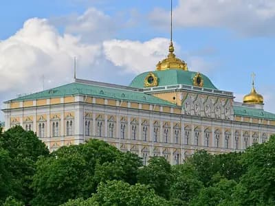 The Grand Kremlin Palace in Moscow with its green roof and gilded cupola above trees under a cloudy sky, photographed on 1 June 2026, a file photograph of the Kremlin and not of Tuesday's meetings