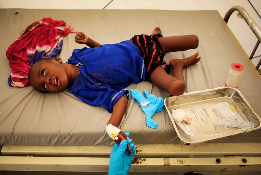 Healthcare worker assisting patients at a community clinic