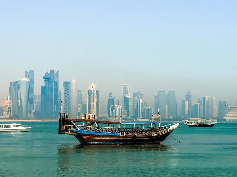 Doha's waterfront skyline during an evening suited to summer sightseeing