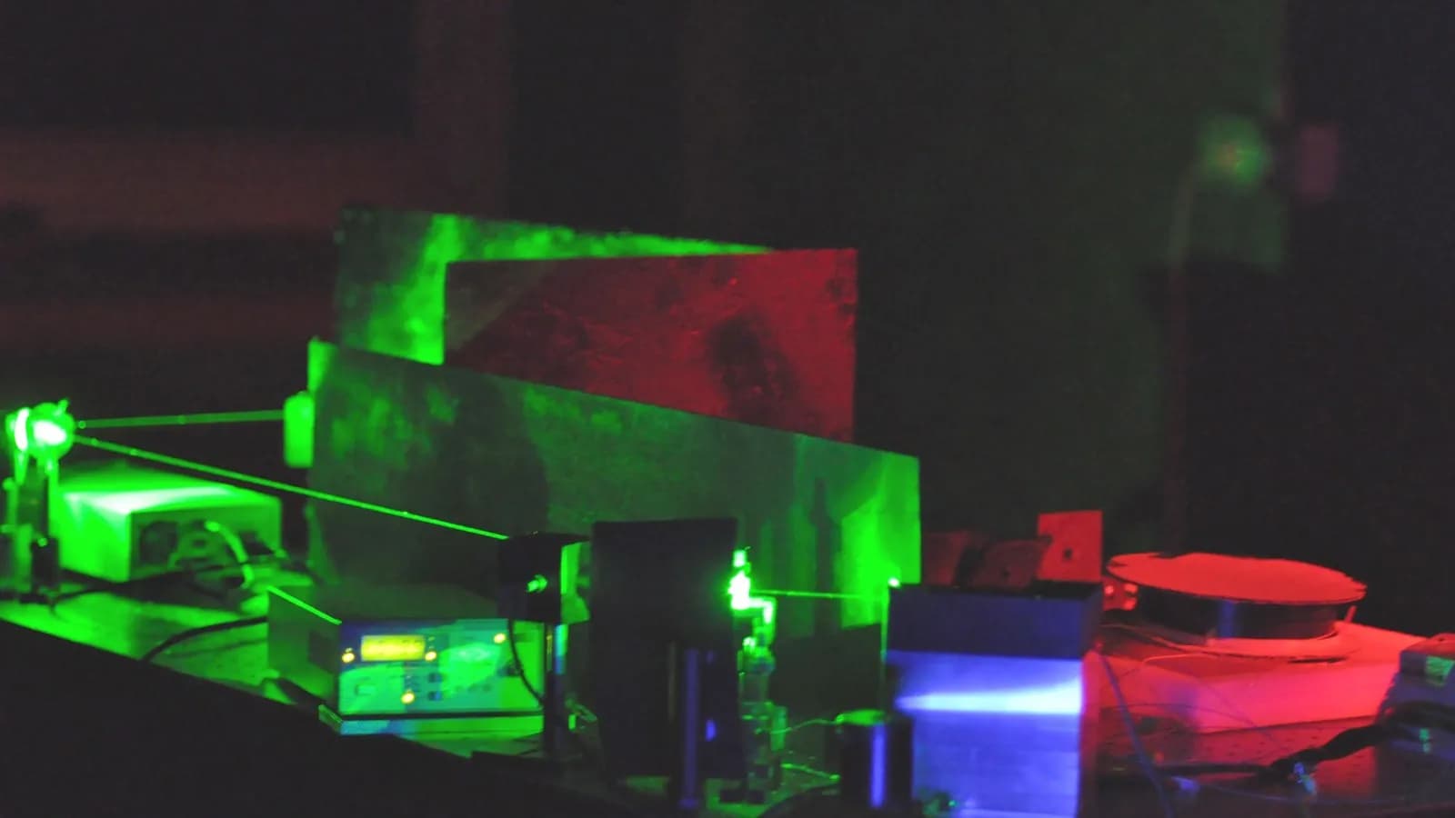 A laser driven photon pair source on an optical bench at NIST, the conventional arrangement this experiment replaced with sunlight