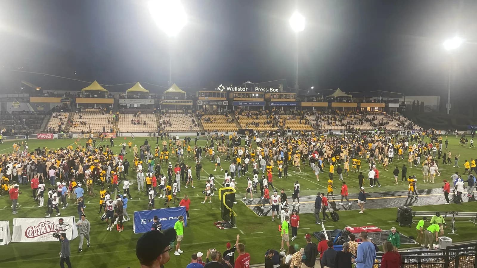 A floodlit American football stadium during a night game, illustrative of the sport and not the Rams-Giants fixture itself, photographed in October 2024