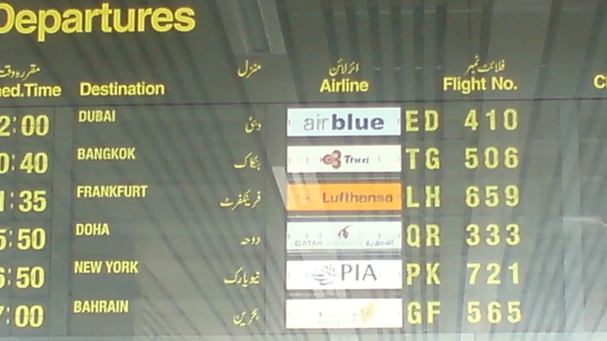A Boeing 787 widebody aircraft parked at an airport gate