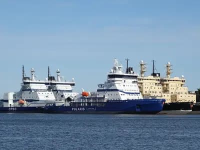 Finnish icebreakers moored at Katajanokka in Helsinki in July 2026; the Rovaniemi summit discussed pooling icebreakers that Finland would help build