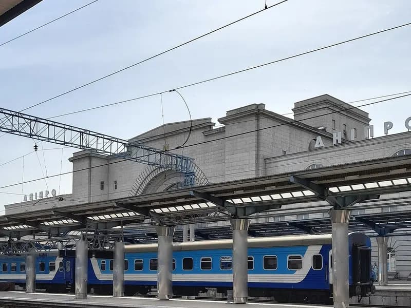 Covered platforms and blue passenger carriages beneath the main building of Dnipro railway station in Ukraine, photographed on 14 May 2021, a file photograph of the station and not of Thursday's strike or its victims