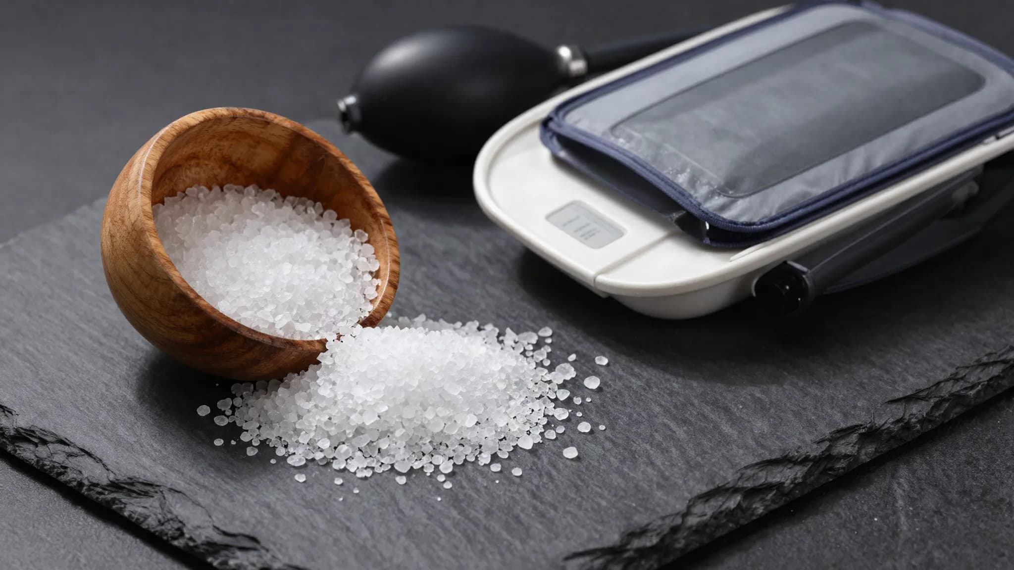 Spilled salt beside a blood pressure cuff