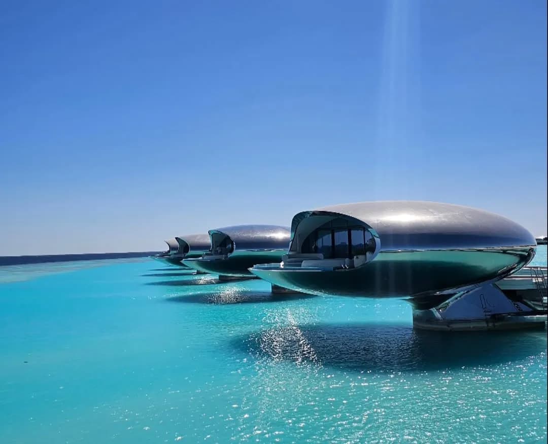An overwater luxury resort villa on a coral atoll in the Red Sea off the Saudi coast