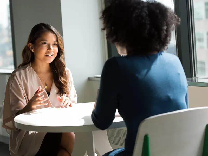 Saudi women collaborating in a modern workplace