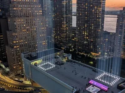 The Tribute in Light installation on the roof of the Battery Parking Garage in Lower Manhattan, seen from above at its switch-on on the evening of 10 September 2026