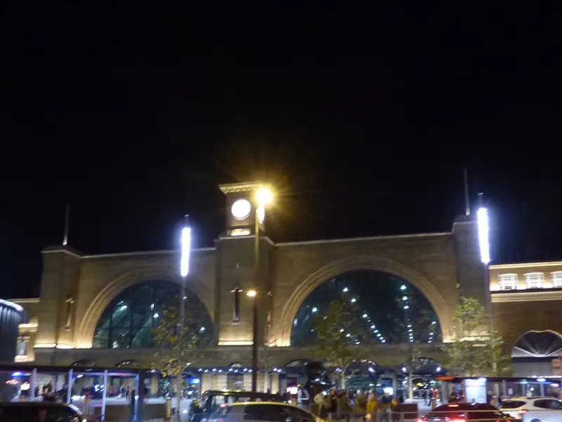 King's Cross station in London at night, seen from the Euston Road