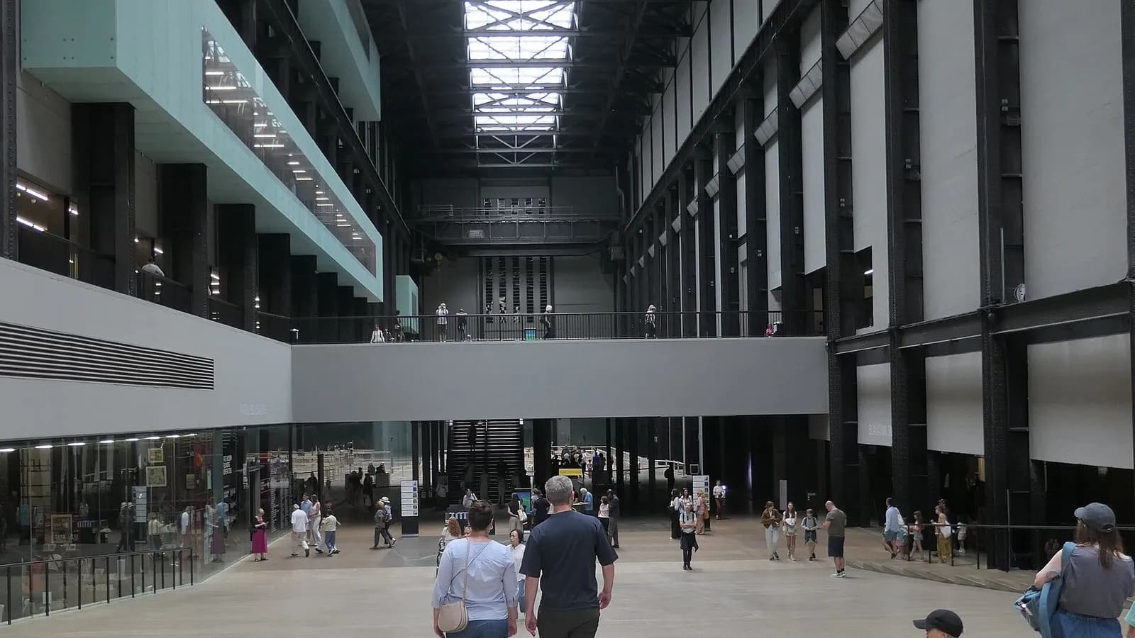 Visitors in the Turbine Hall at Tate Modern in London under the skylight, photographed in August 2026, a file photograph of the hall before the new commission and not of Hold