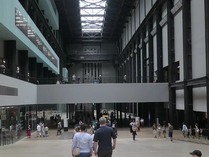 Visitors in the Turbine Hall at Tate Modern in London under the skylight, photographed in August 2026, a file photograph of the hall before the new commission and not of Hold