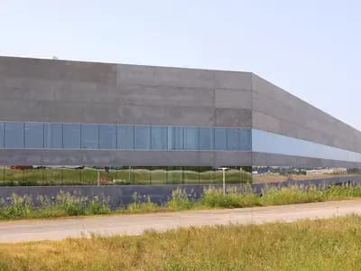 A long grey Tesla Gigafactory Texas building with a band of glass near Austin, photographed on 17 June 2022, a file photograph of the factory and not of this quarter's production