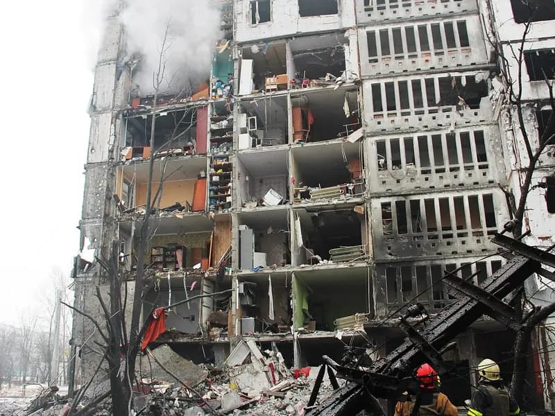 Firefighters at a damaged apartment block in Kharkiv, Ukraine, after a Russian attack, photographed on 23 January 2024, a file photograph illustrative of attacks on the city and not of this week's strikes on energy sites