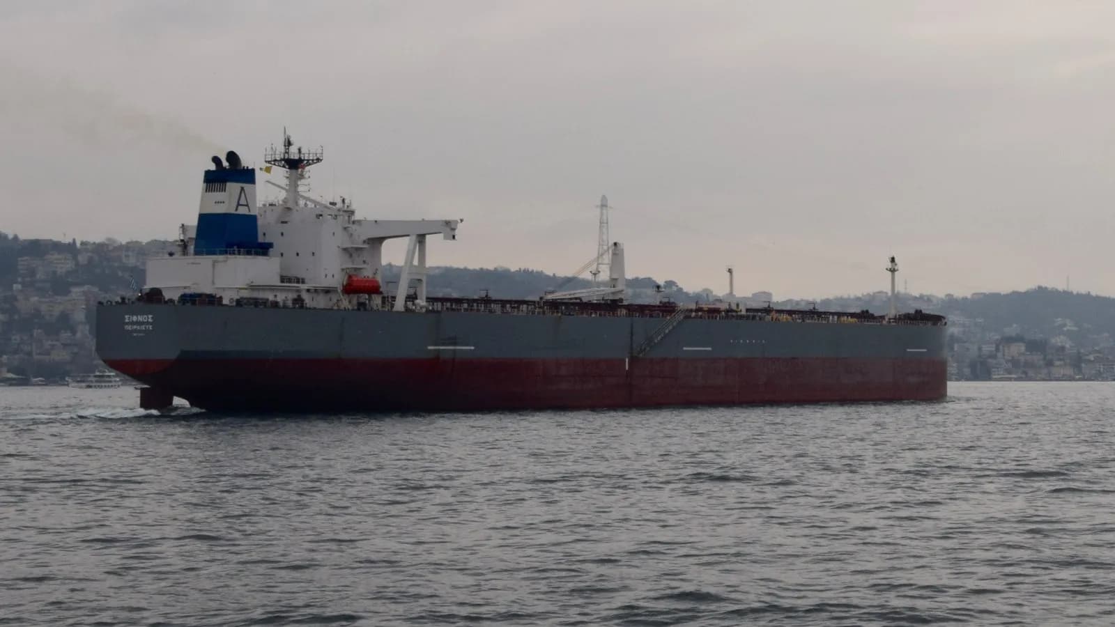 A crude oil tanker in the Bosphorus Strait in Istanbul, illustrative of tanker traffic through a strategic strait and not the Strait of Hormuz itself, photographed in December 2014