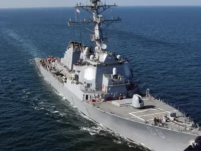 A United States guided-missile destroyer under way in the Gulf of Oman, in an archive US Navy photograph; not one of the ships involved this week