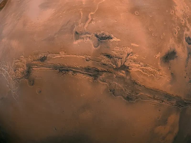 A view of Mars with the Valles Marineris canyon system running across the middle of the globe, assembled from Viking 1 Orbiter images taken on 22 February 1980, a file image of the canyon and not related to the 2021 marsquake itself