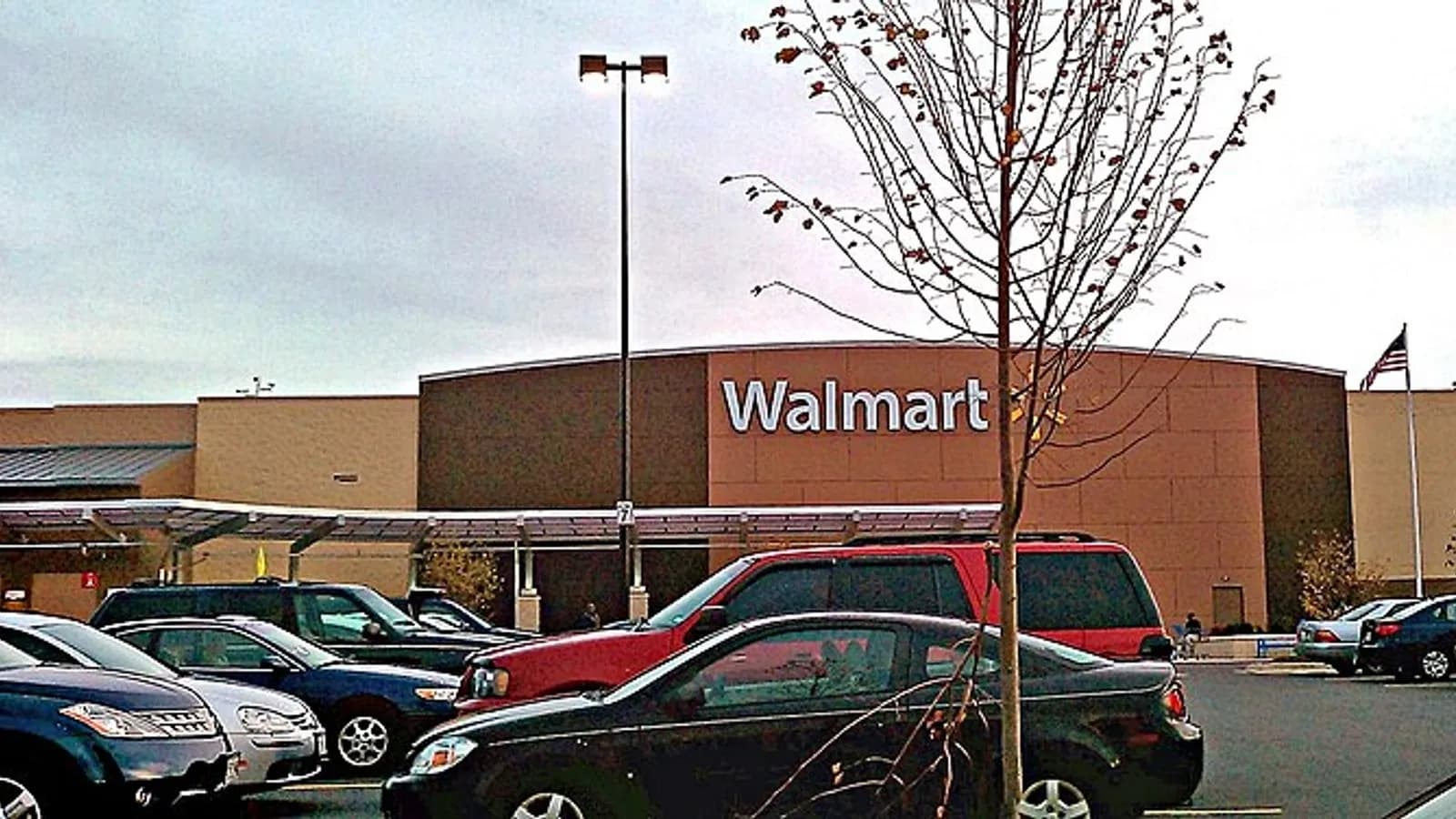 The brown brick front of a Walmart Supercenter in Laurel, Maryland, with the company name on the wall above a car park with cars and a bare tree, photographed on 30 October 2010, a file photograph illustrative of a Walmart store and not of the Agent Gateway