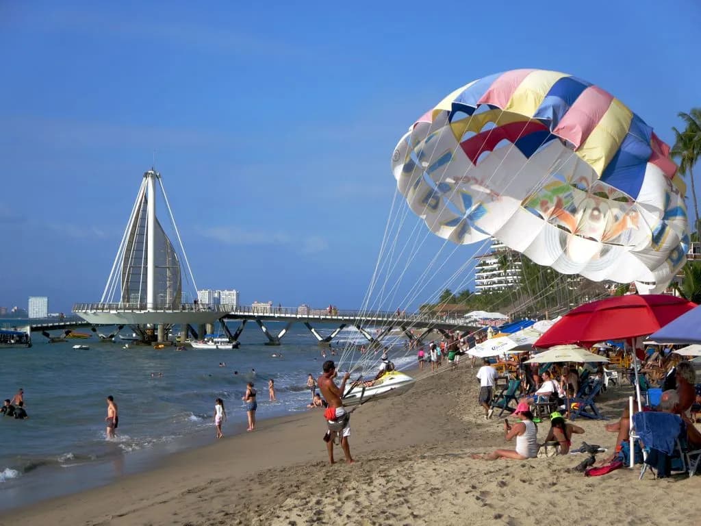 An aerial view of a lesser-known coastal destination with turquoise water and green terrain