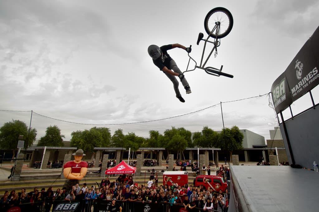 An action-sports athlete competing before a festival crowd