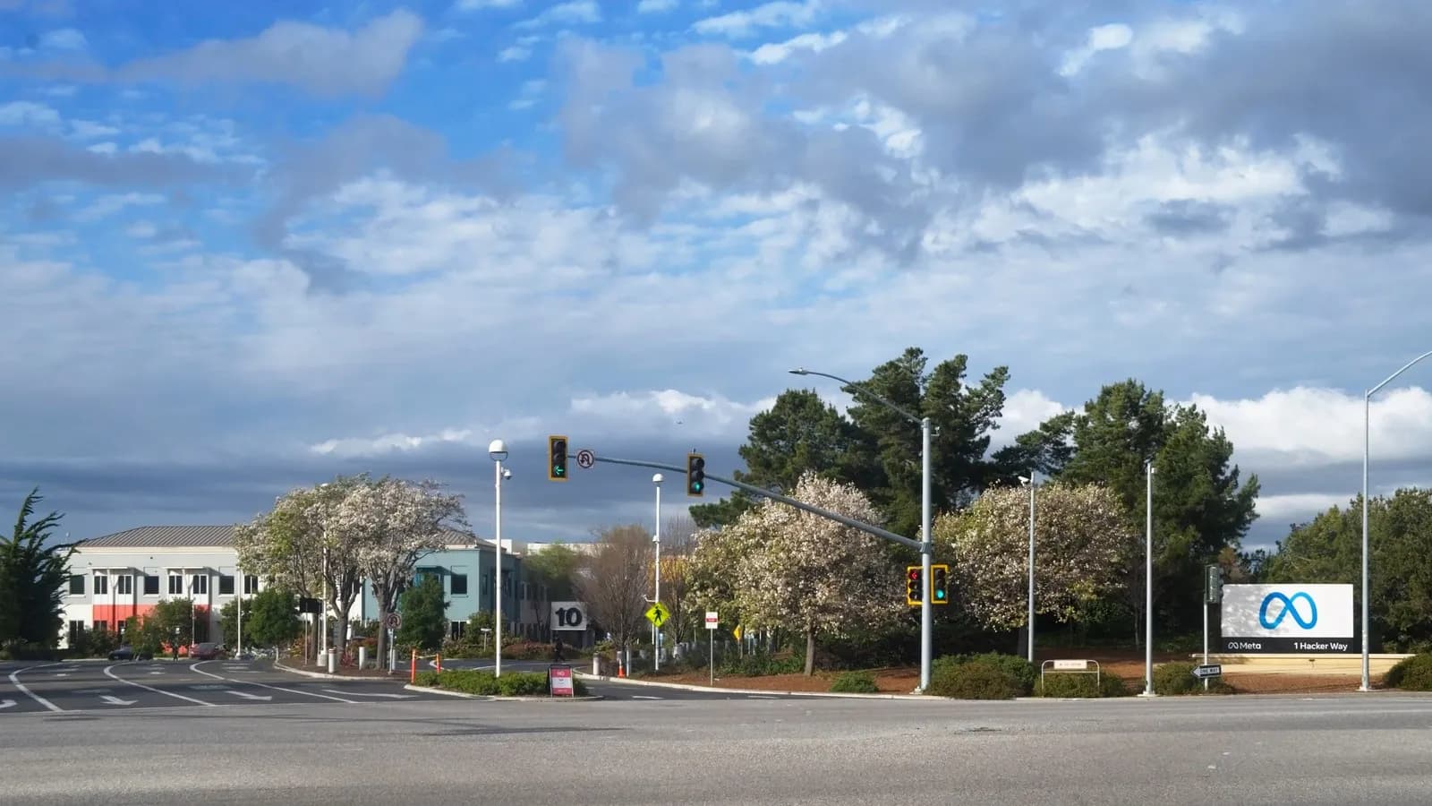 The Meta sign at 1 Hacker Way, the company's headquarters in Menlo Park, California, photographed in 2022